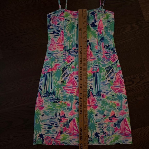The image shows a Lilly Pulitzer Shelli Stretch Dress in a colorful, abstract pr - Picture 3 of 7